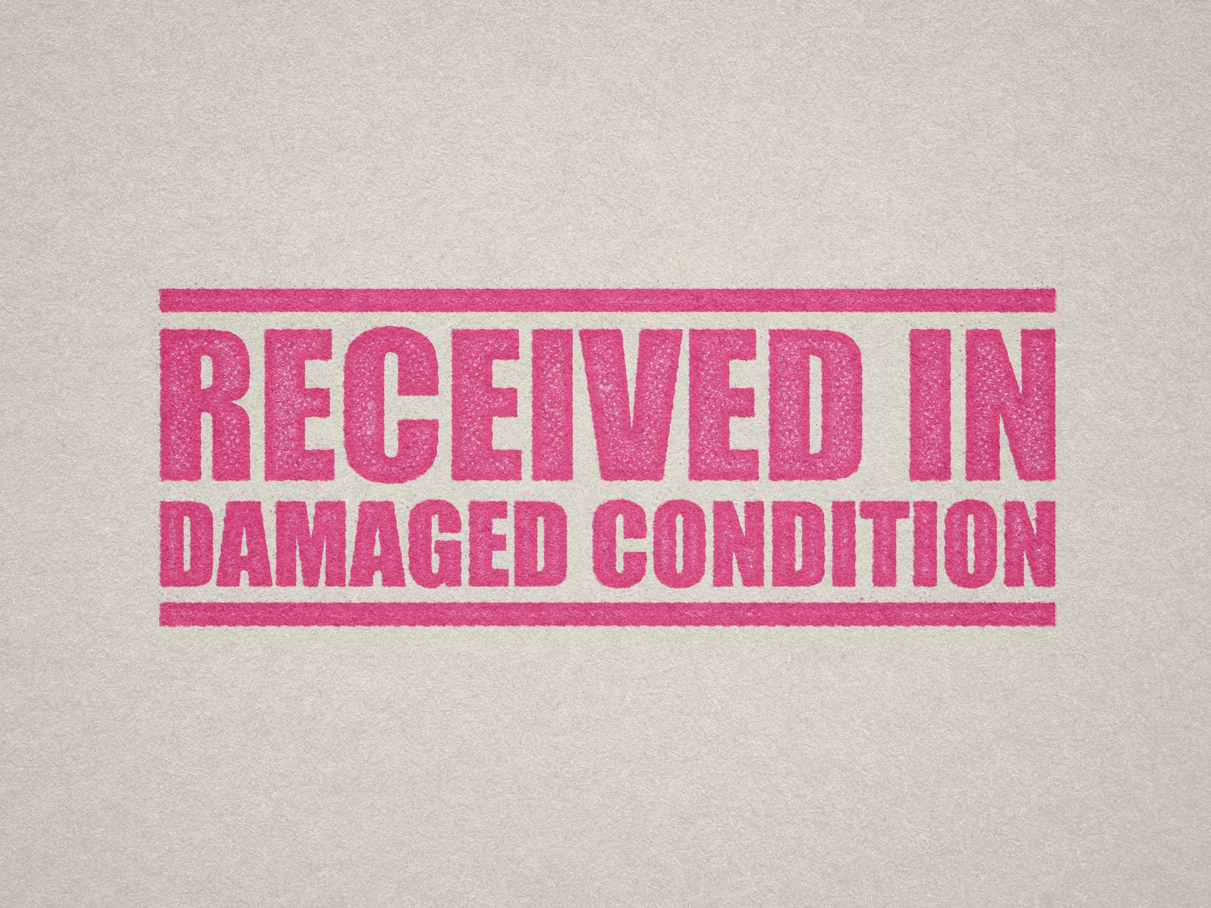 pre-designed office stamp, RECEIVED IN DAMAGED CONDITION text in Pink ink
