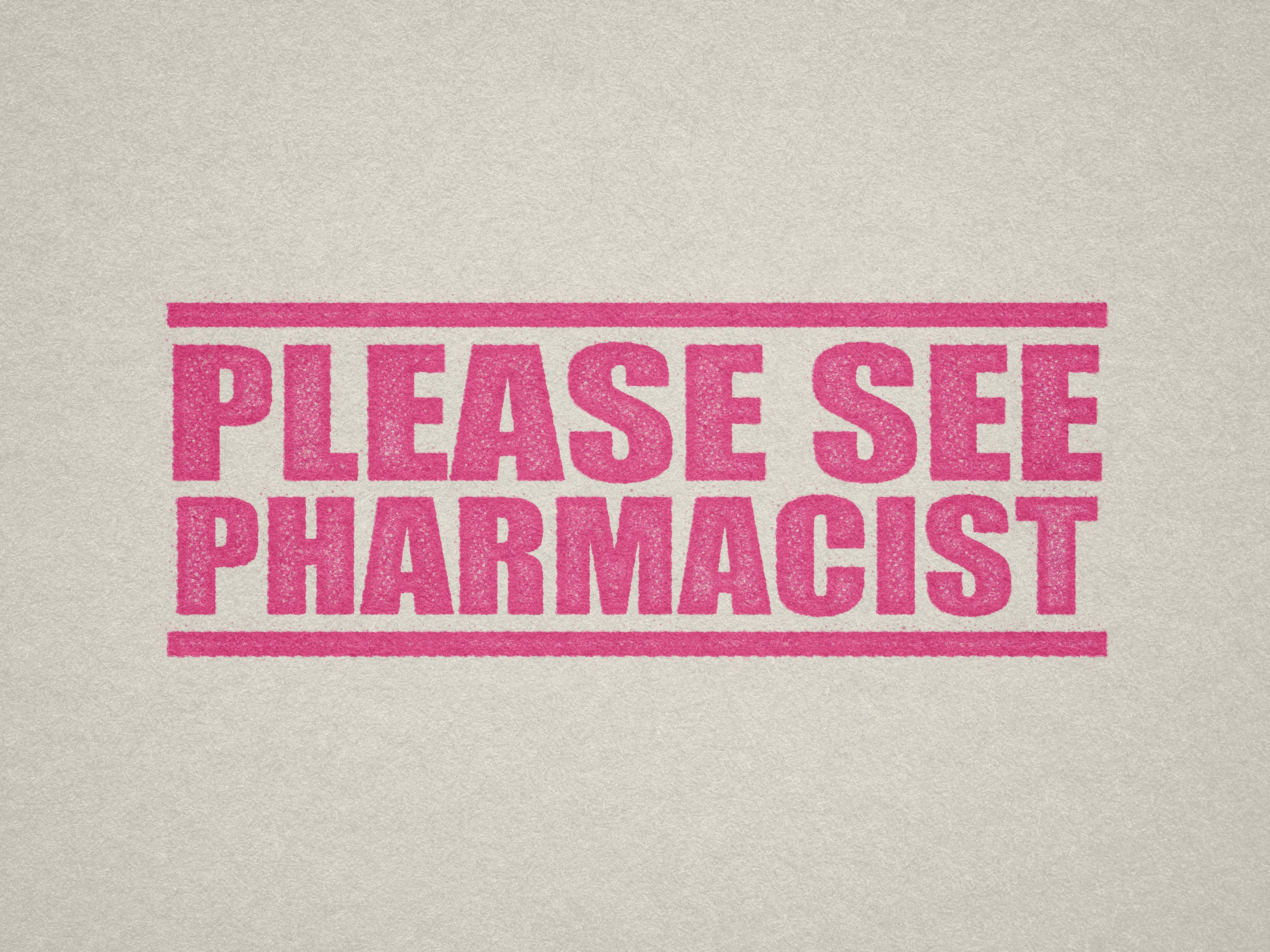 'PLEASE SEE PHARMACIST' office stamp pink ink