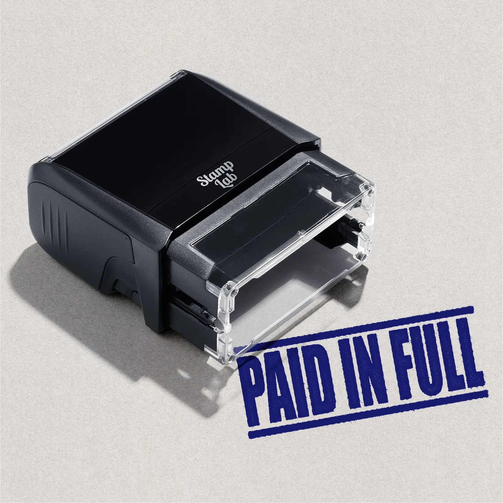 mock up design or lifestyle image of 'Paid In Full' rubber stamp blue ink in paper background stampers hand stamp office business inventory documents