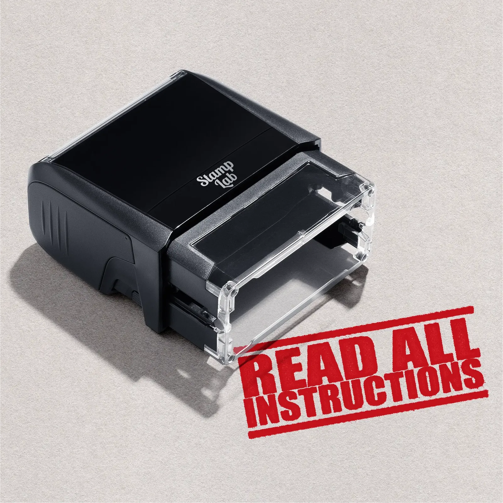 self-inking stamp with readymade designed "Read All Instructions" in red ink