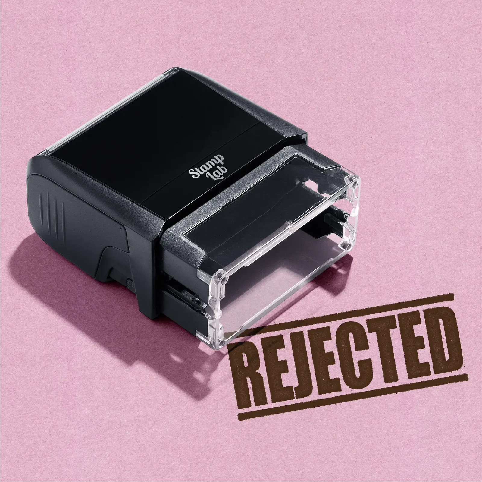 Pre-inked rubber stamp, ready made design REJECTED in Brown ink