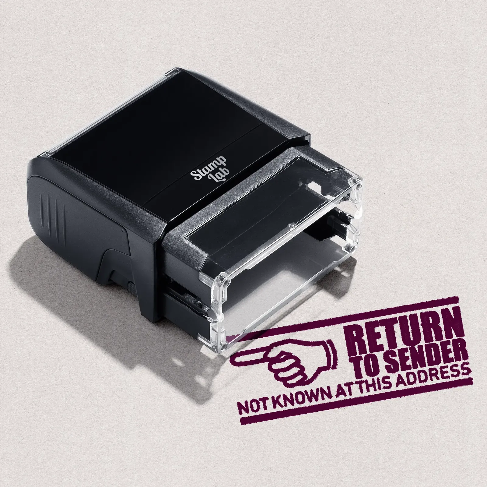 Black stamp with 'Return to Sender' text in Maroon ink
