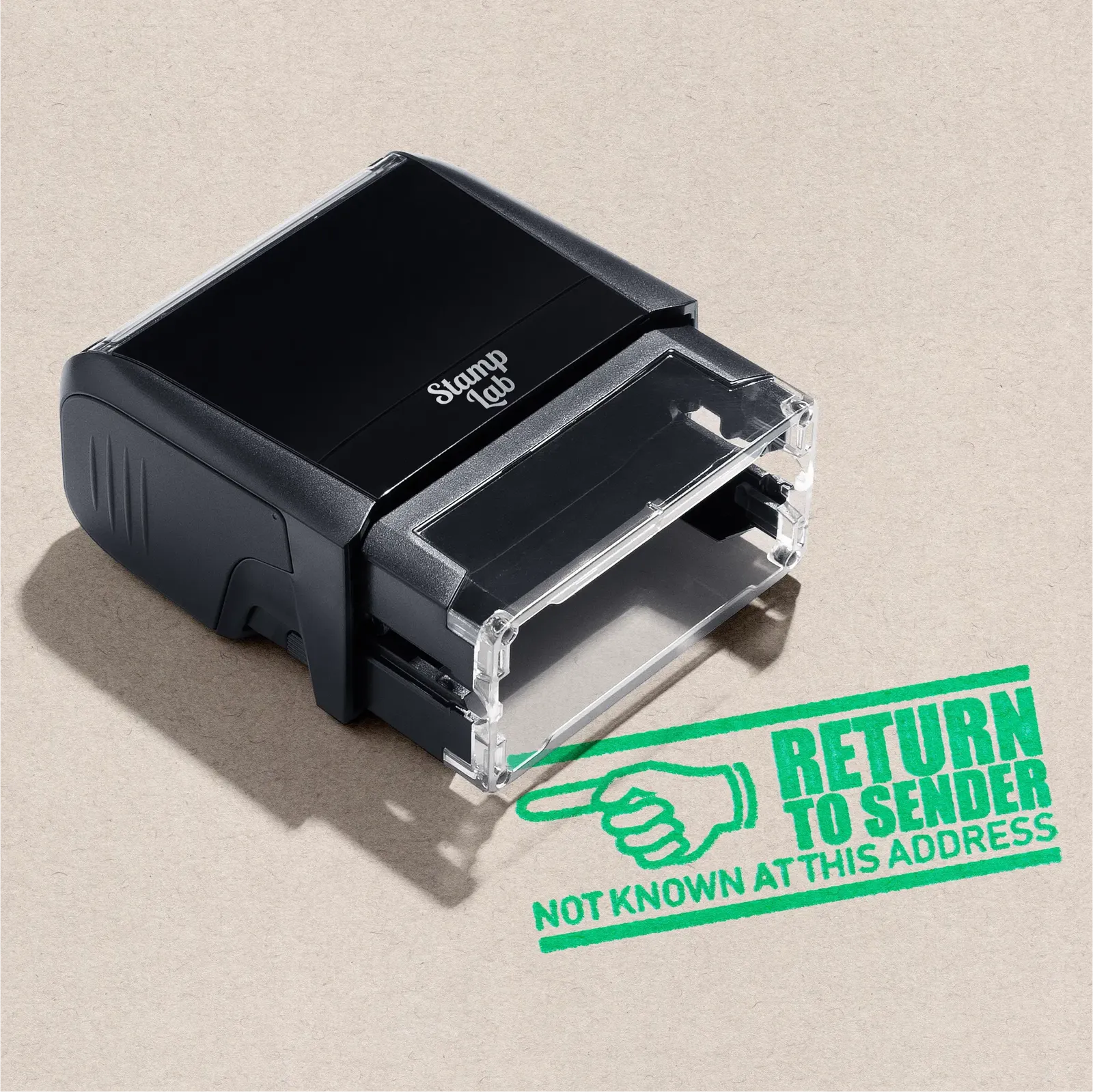 Black self-inking stamp machine with a mint 'Return to Sender' stamp design