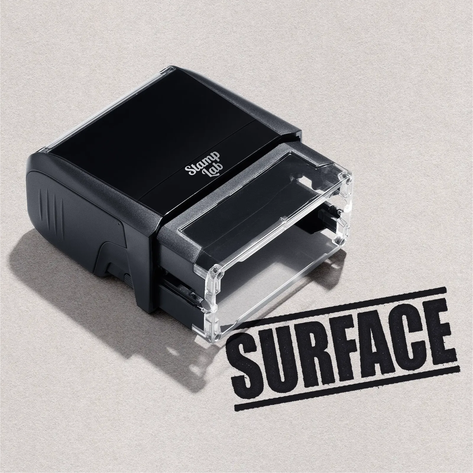 Black stamp with 'Surface' text in Black Ink