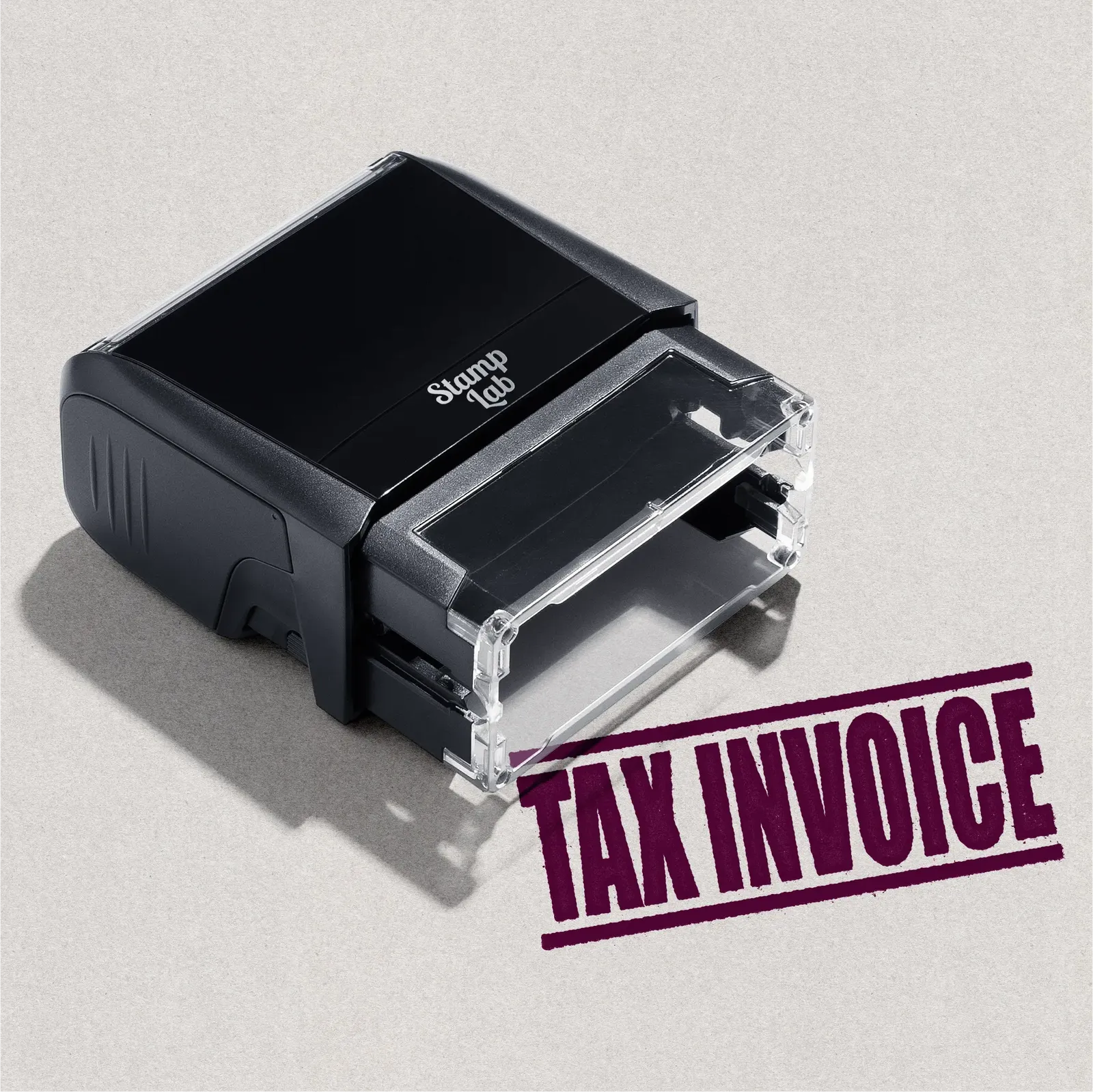 mock up design or lifestyle image of 'Tax Invoice' rubber stamp maroon ink in paper background stampers hand stamp office business inventory documents self inking prefill refillable stamps stamping