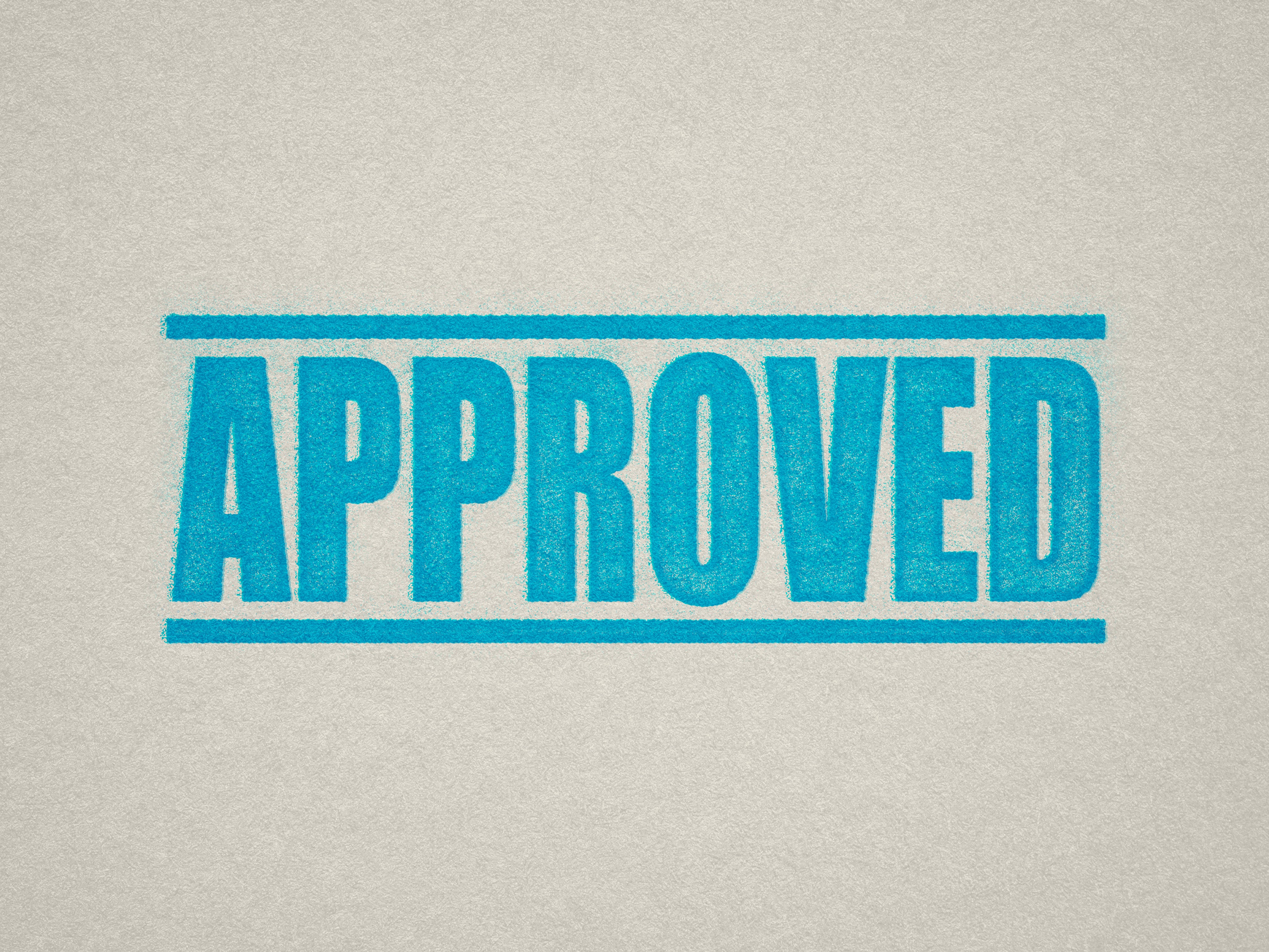 Mock up design or lifestyle image of 'APPROVED' rubber stamp turquoise ink in paper background stampers hand stamp office business inventory documents self inking prefill refillable stamps stamping