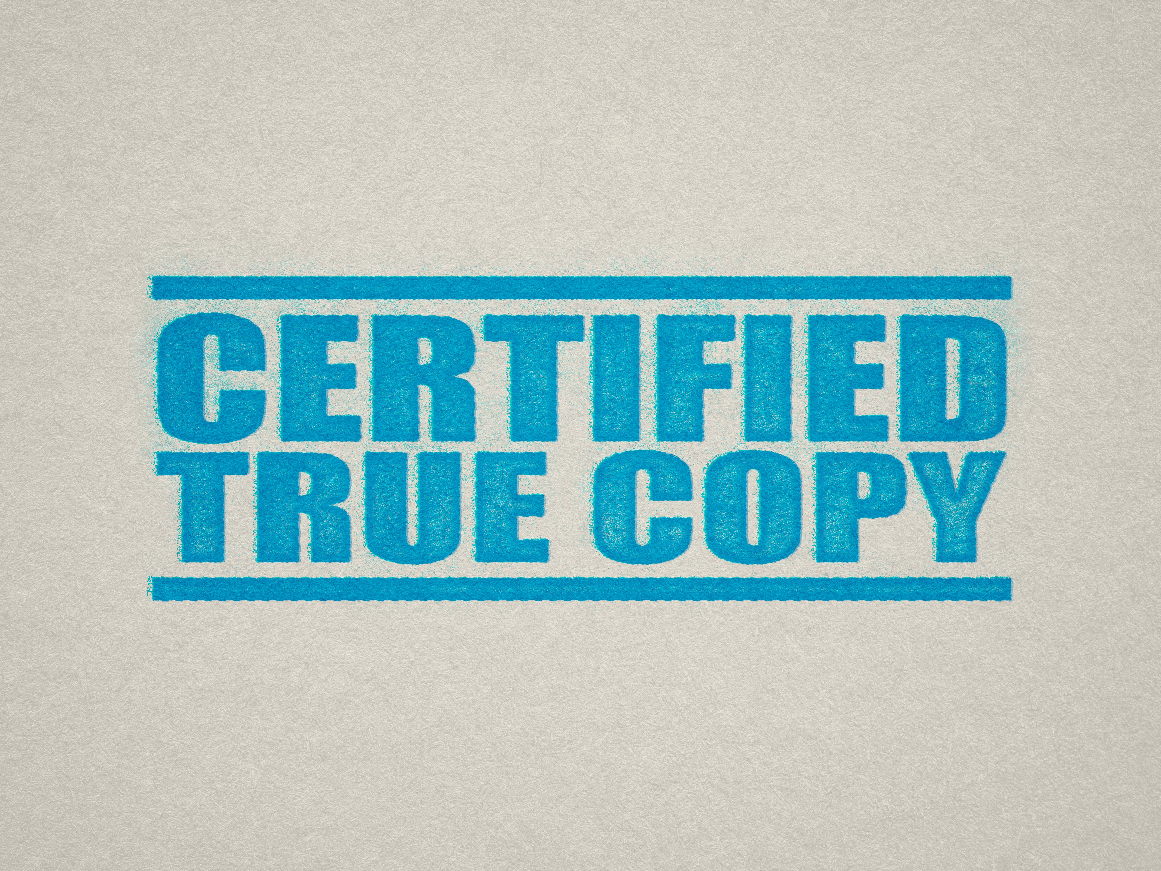mock up design of 'Certified True Copy' rubber stamp turquoise ink in paper background stampers hand stamp office business inventory documents self inking prefill refillable stamps stamping