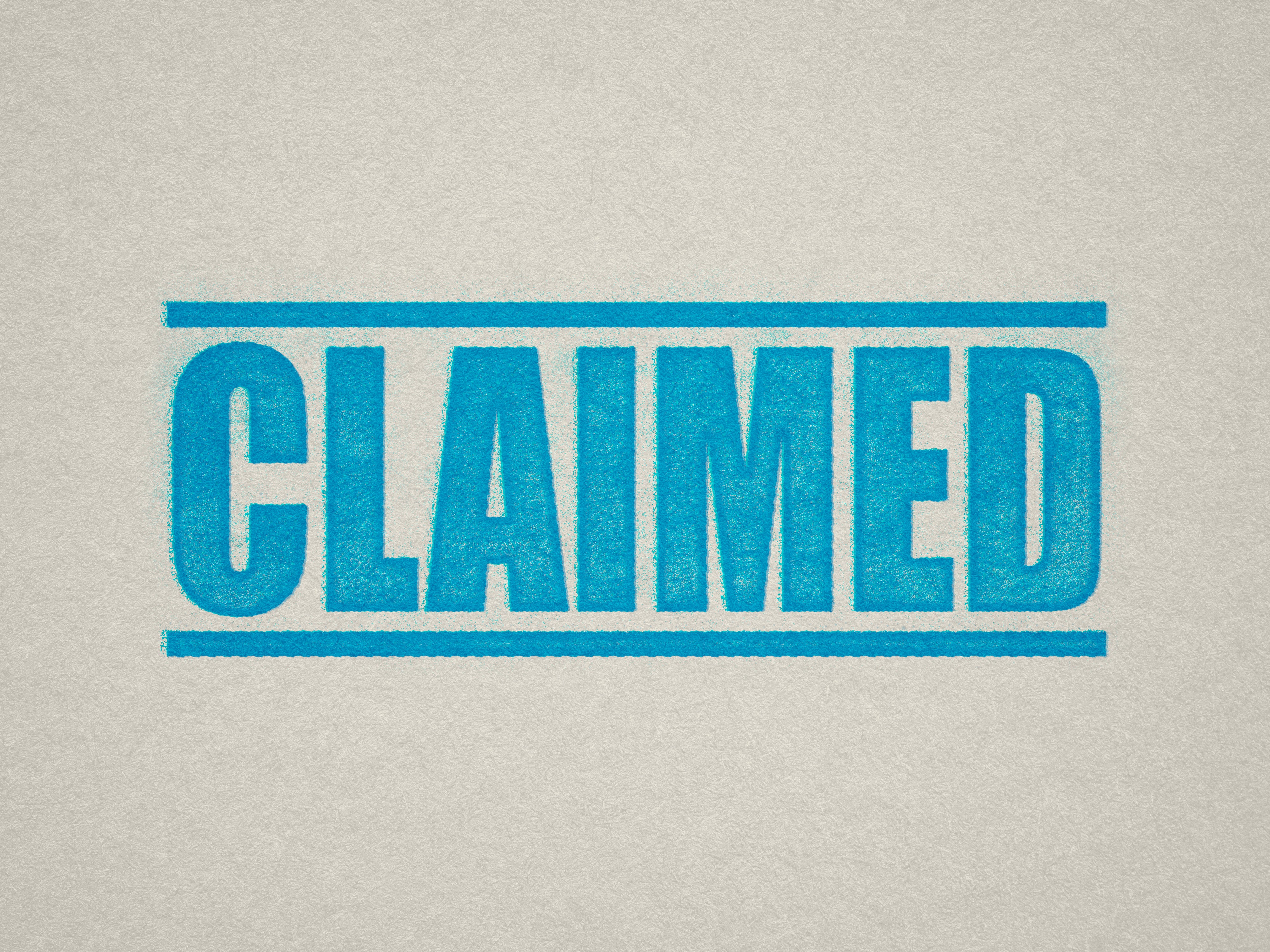 mock up design of 'Claimed' rubber stamp turquoise ink in paper background stampers hand stamp office business inventory documents self inking prefill refillable stamps stamping