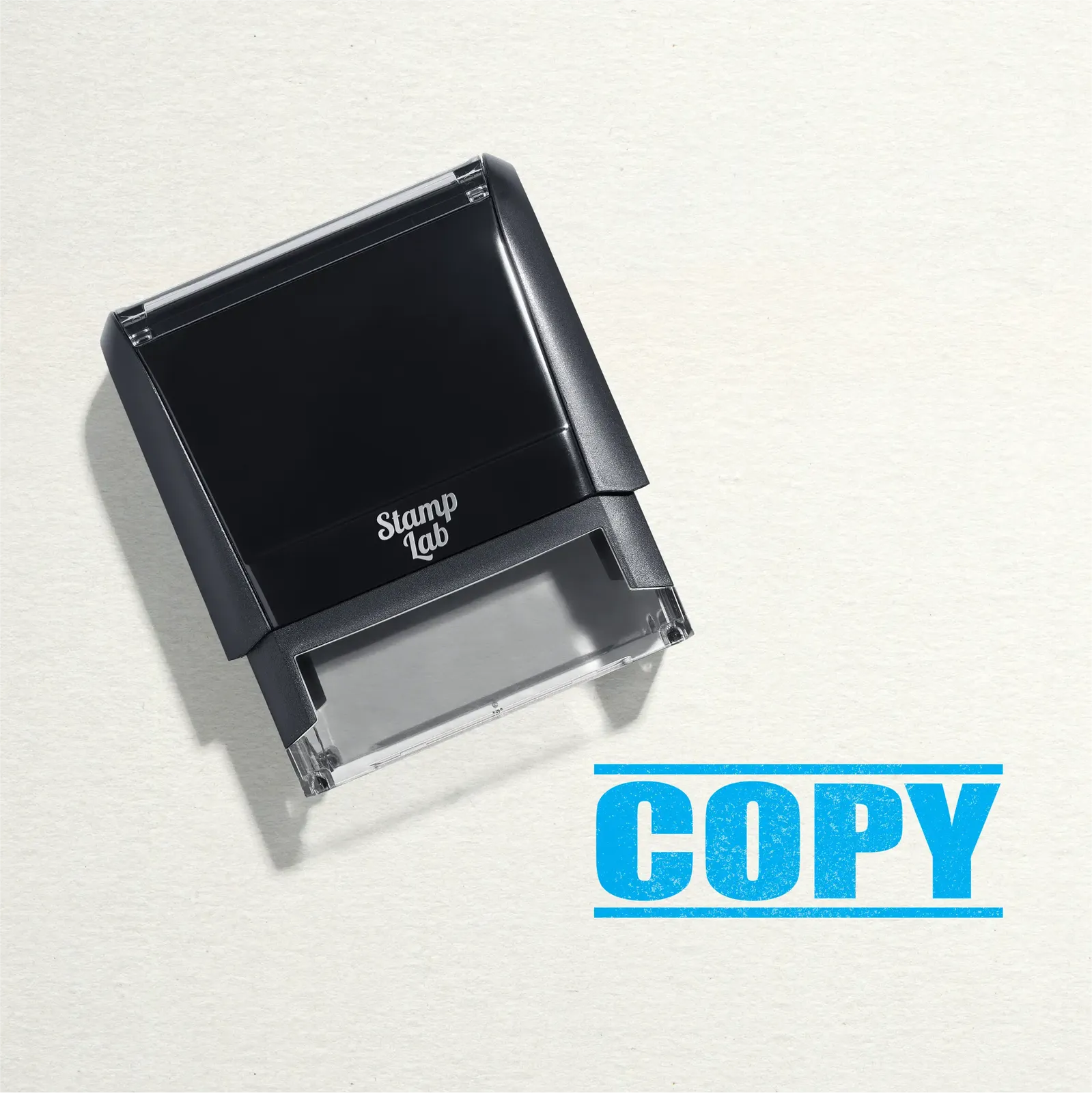 "Mock up design or lifestyle image of 'COPY' rubber stamp turquoise ink in paper background stampers hand stamp office business inventory documents sky blue
"