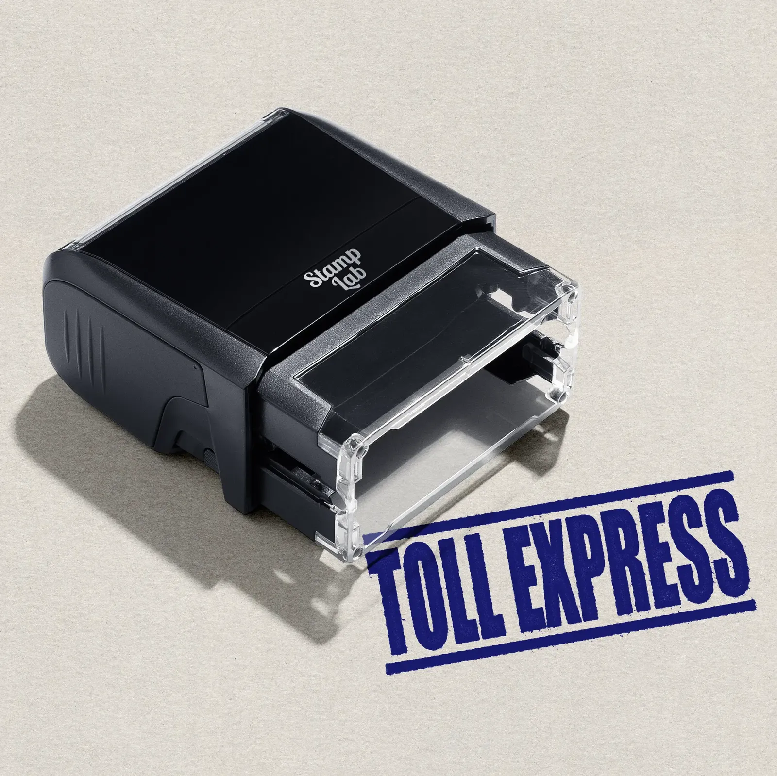 pre-inked stamp with "Toll Express" design in blue ink