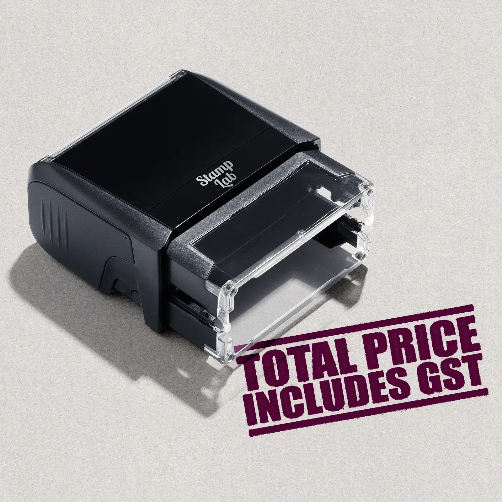 self-inking rubber stamp re-designed with "Total Price Includes GST" text