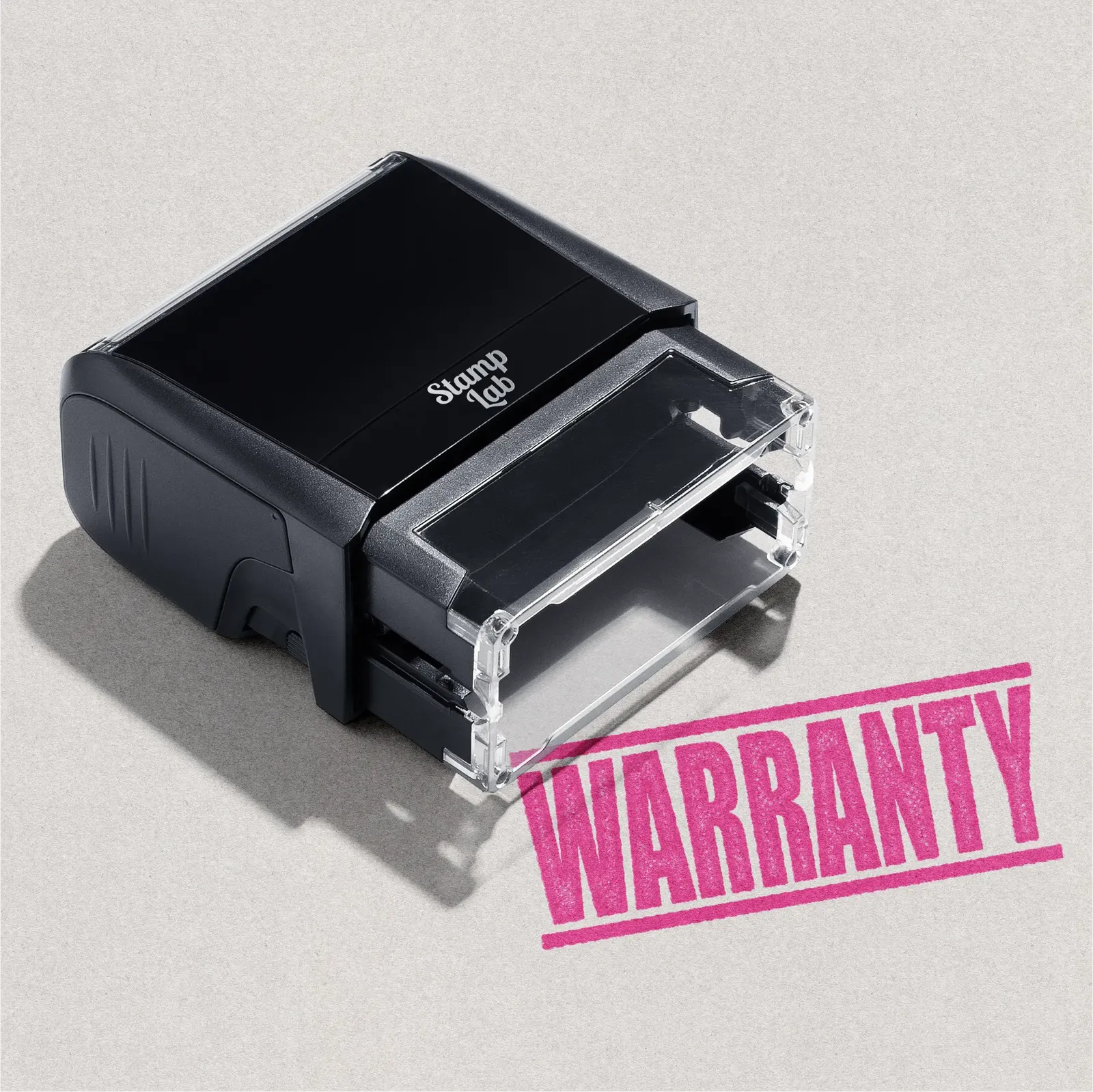 mock up design or lifestyle image of 'Warranty ' rubber stamp pink ink in paper background stampers hand stamp office business inventory documents self inking prefill refillable stamps stamping