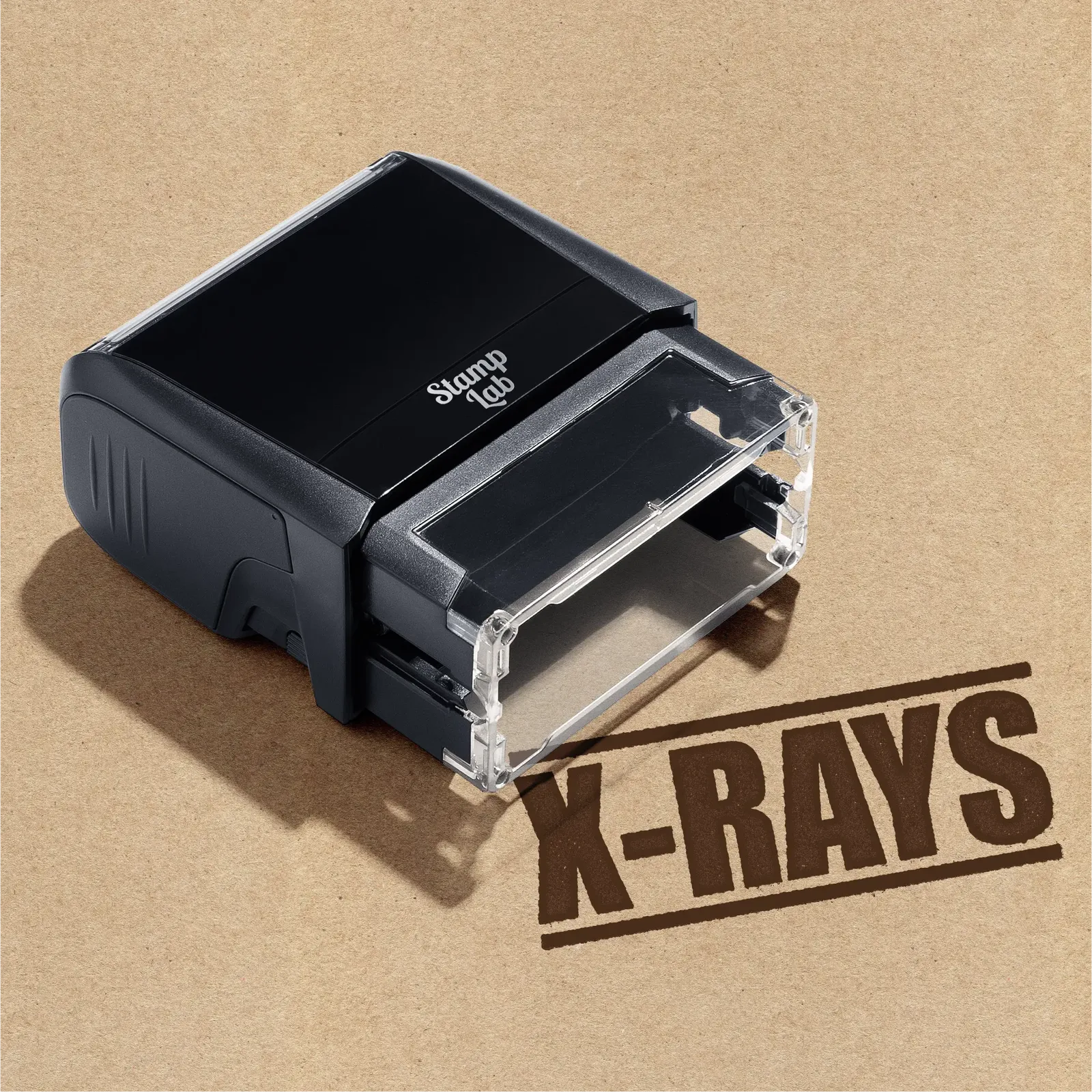 Black stamp with 'X-RAYS' text on a brown background