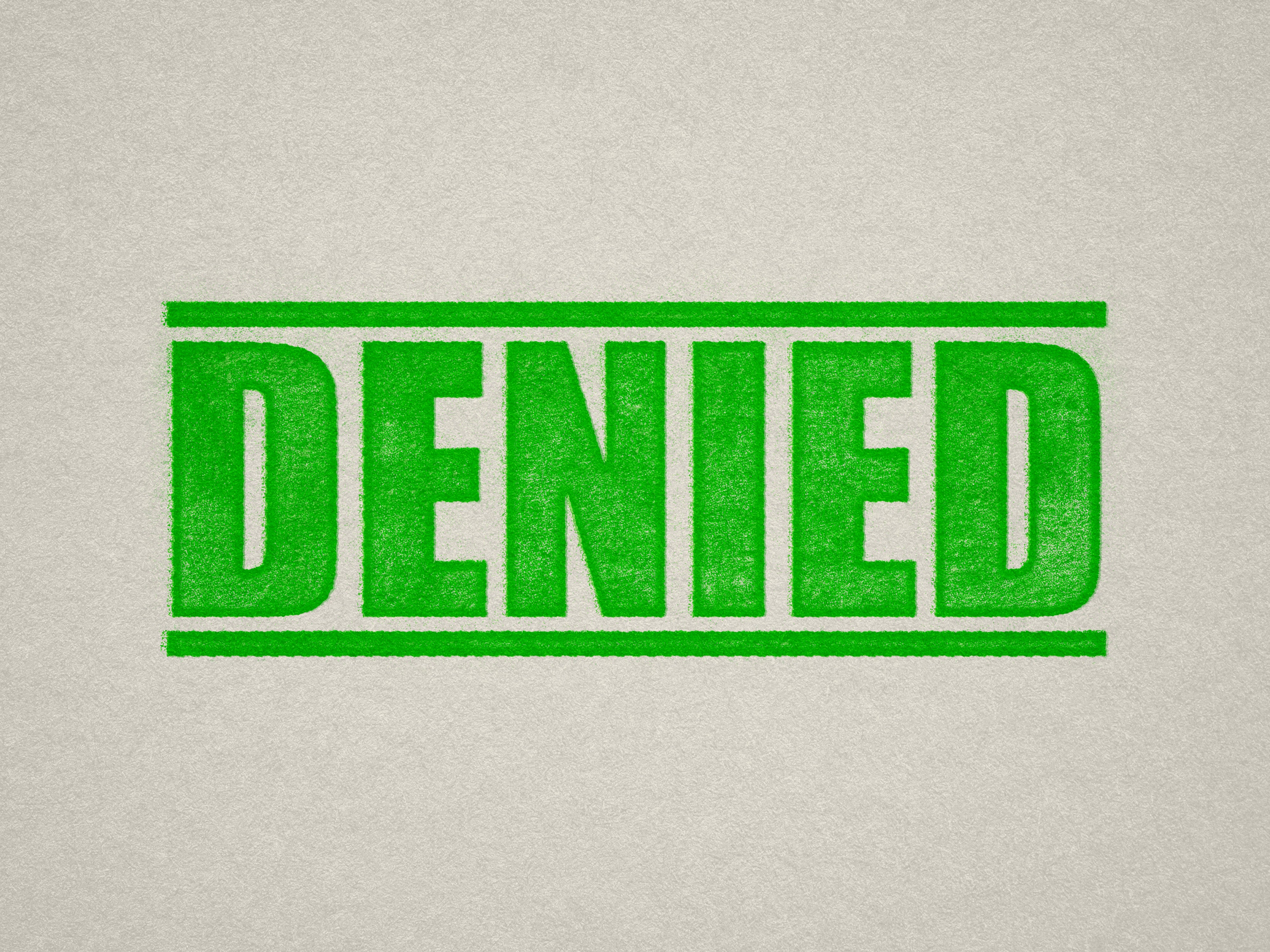 mock up design of 'Denied' rubber stamp apple green ink in paper background stampers hand stamp office business inventory documents self inking prefill refillable stamps stamping