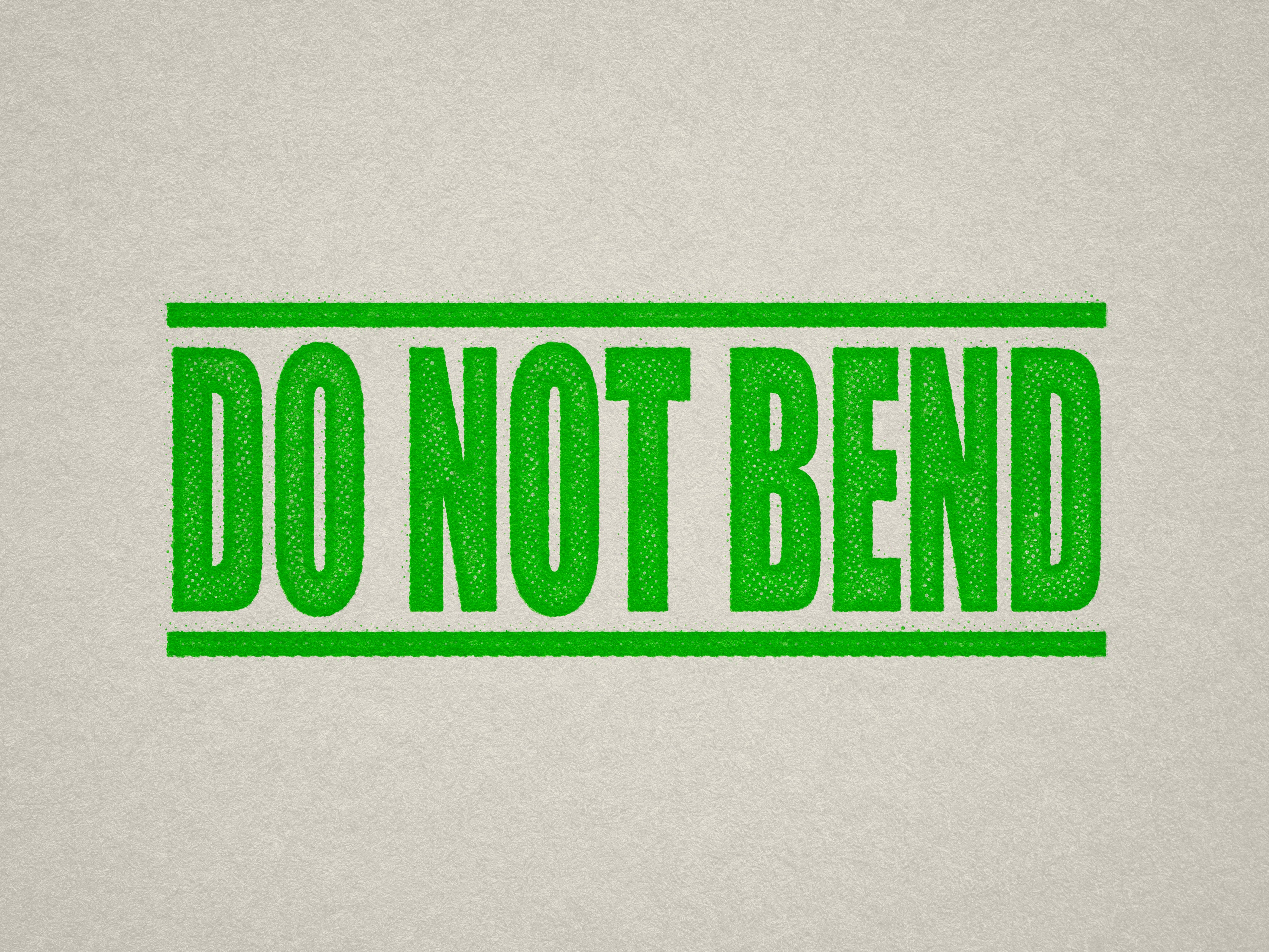 mock up design of DO NOT BEND rubber stamp apple green ink in paper background stampers hand stamp office business inventory documents