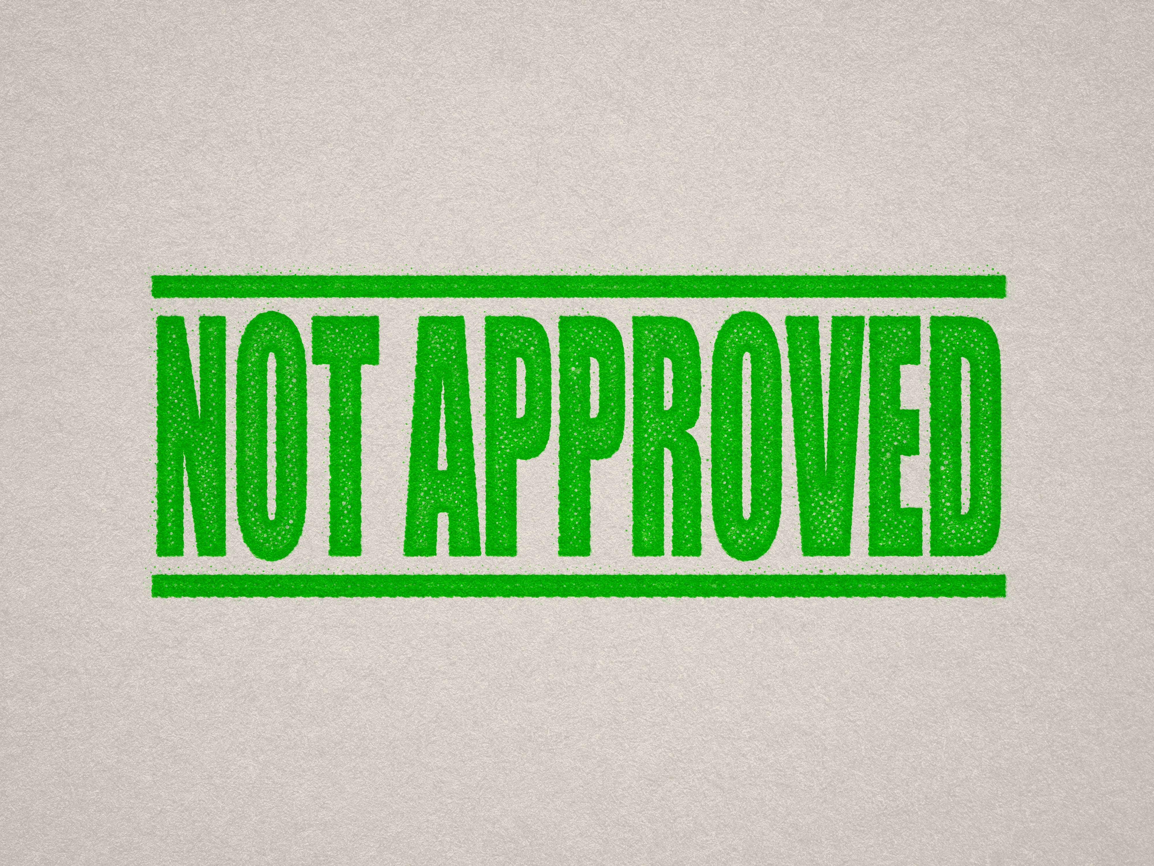 mock up design of 'Not Approved' rubber stamp apple green ink in paper background stampers hand stamp office business inventory documents self inking prefill refillable stamps stamping