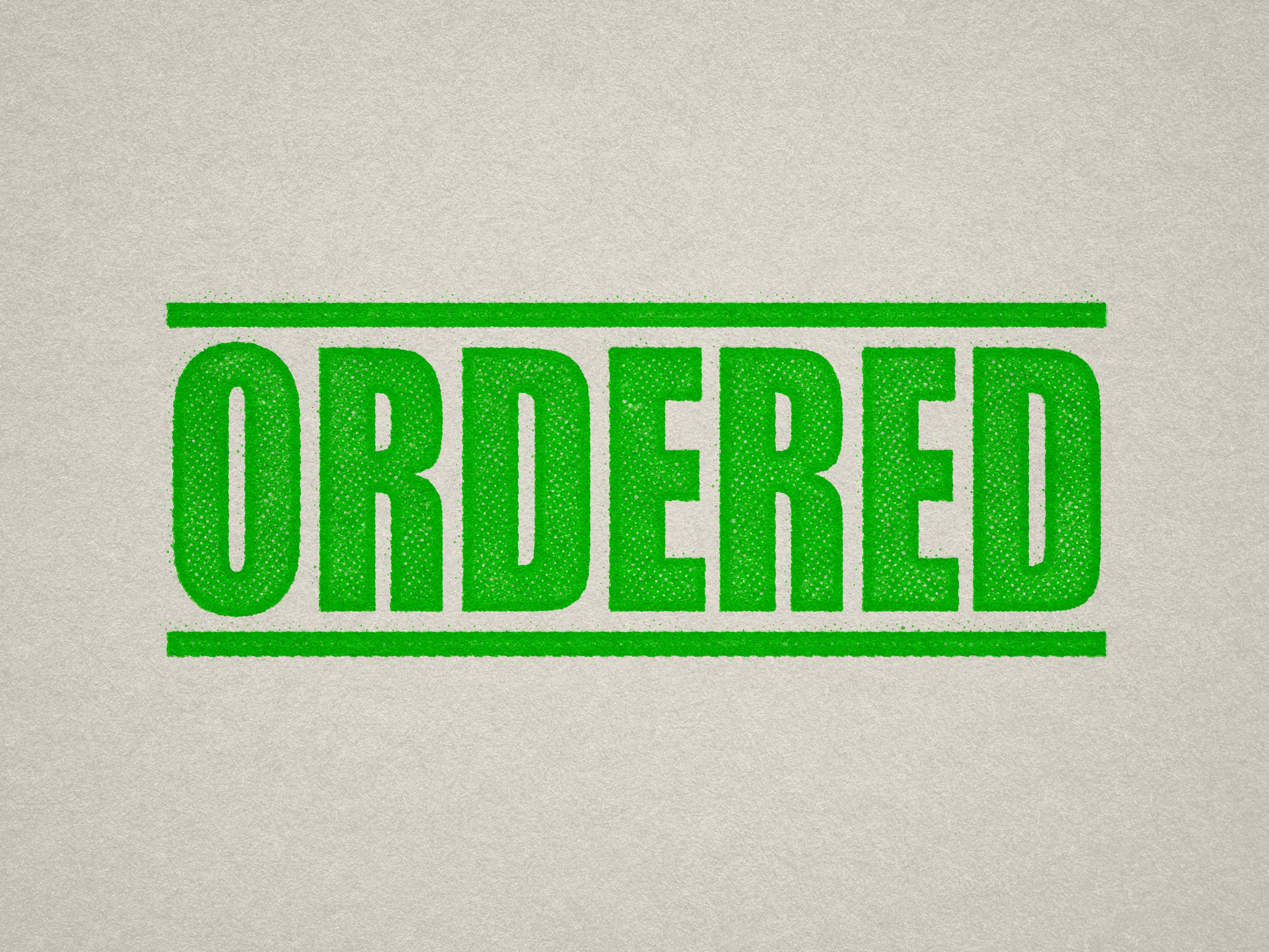 Mock up design or lifestyle image of 'ORDERED' rubber stamp apple green ink in paper background stampers hand stamp office business inventory documents self inking prefill refillable stamps stamping