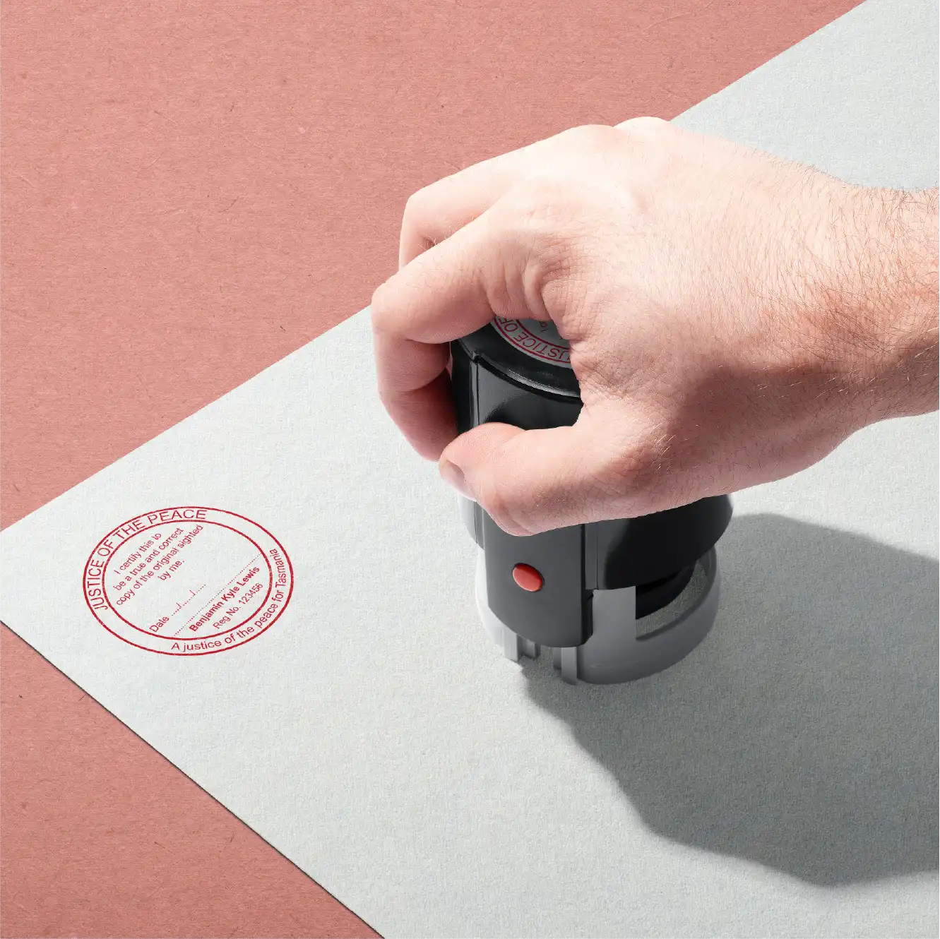man stamping Best JP Stamps Tasmania