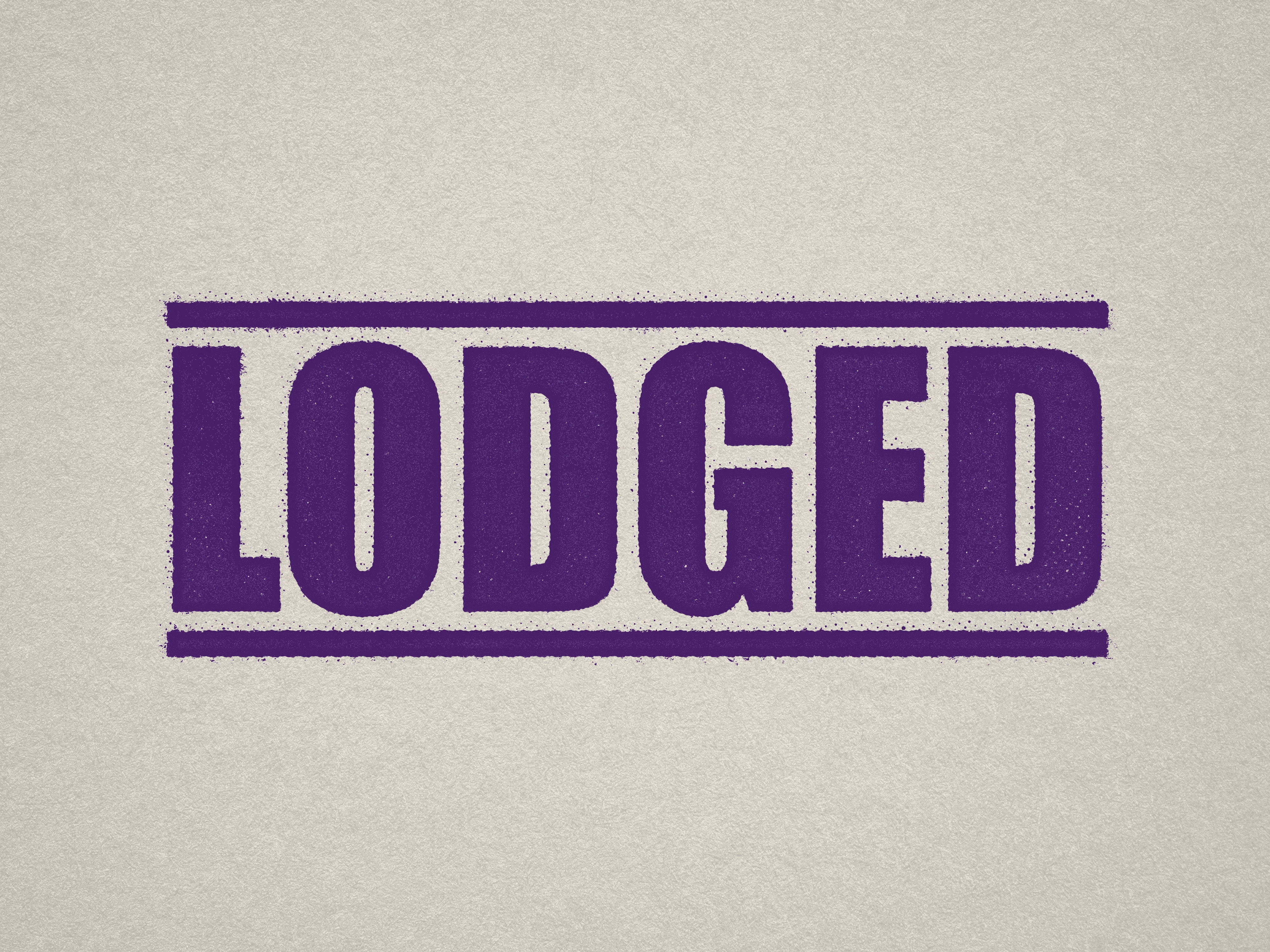 mock up design of 'Lodged' rubber stamp violet ink in paper background stampers hand stamp office business inventory documents purple