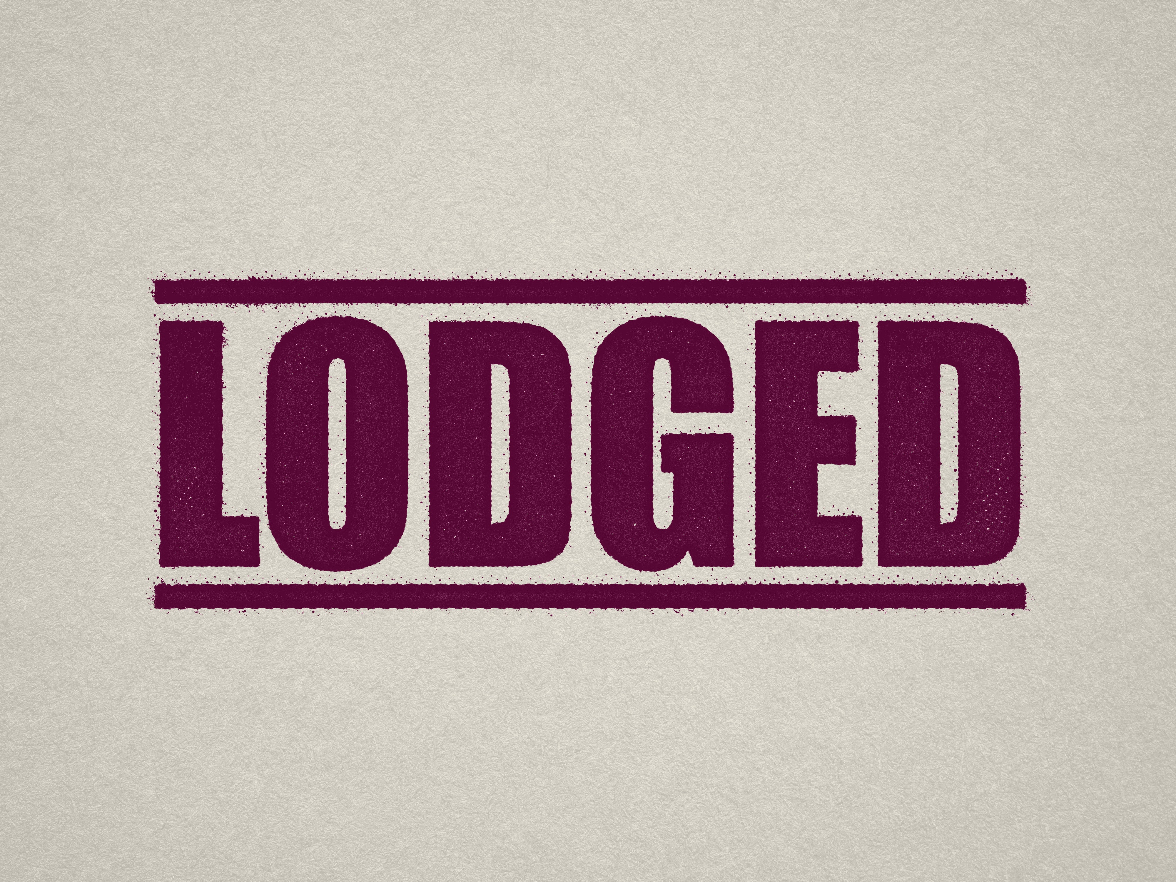 mock up design of 'Lodged' rubber stamp maroon ink in paper background stampers hand stamp office business inventory documents