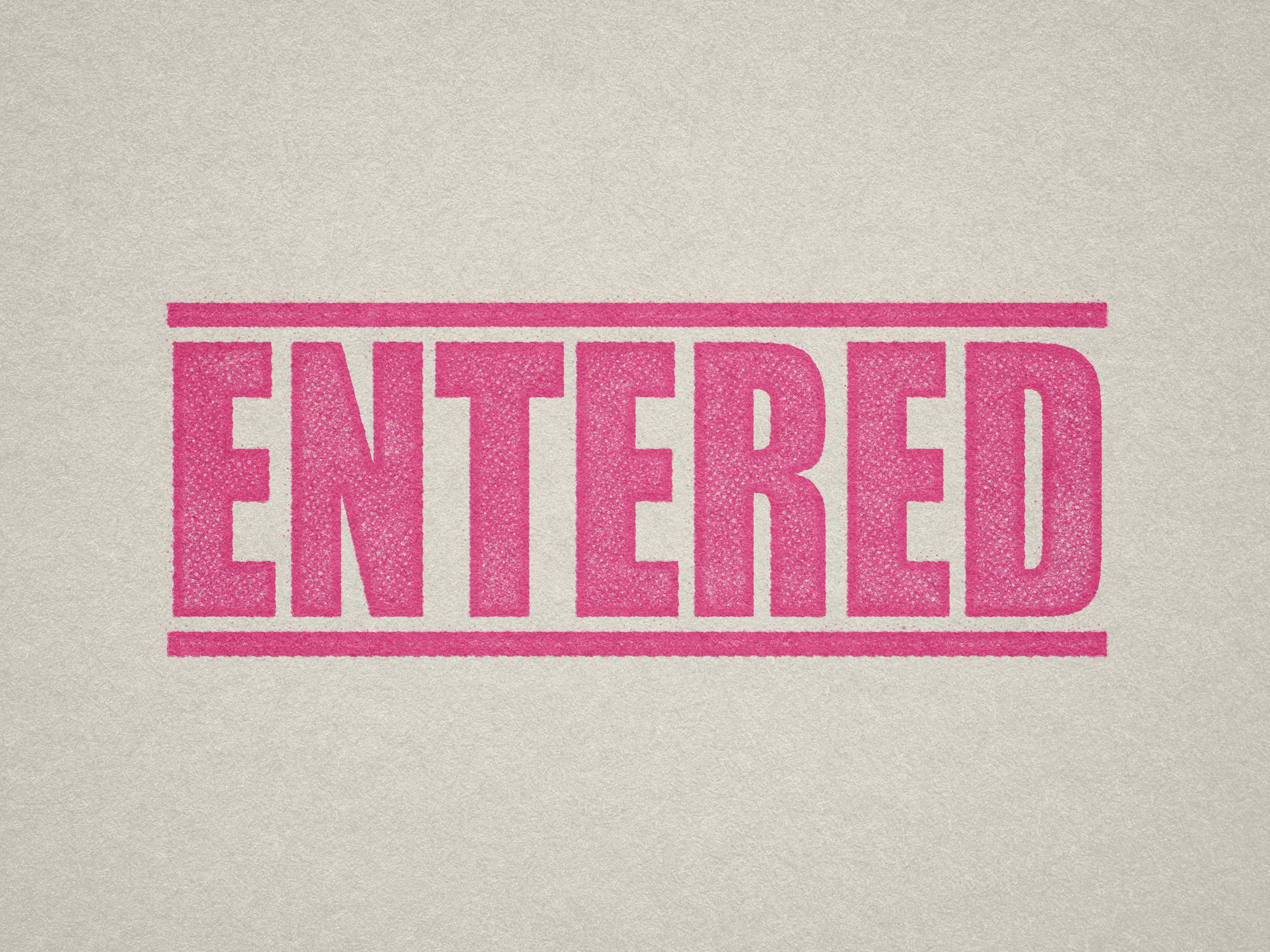 Mock up design or lifestyle image of 'ENTERED' rubber stamp pink ink in paper background stampers hand stamp office business inventory documents self inking prefill refillable stamps stamping