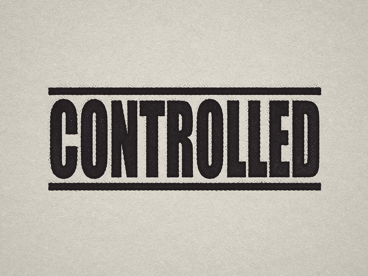 "Mock up design or lifestyle image of 'CONTROLLED' rubber stamp black ink in paper background stampers hand stamp office business inventory documents black
"