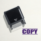 "Mock up design or lifestyle image of 'COPY' rubber stamp violet ink in paper background stampers hand stamp office business inventory documents violet/purple
"
