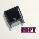 "Mock up design or lifestyle image of 'COPY' rubber stamp maroon ink in paper background stampers hand stamp office business inventory documents maroon
"