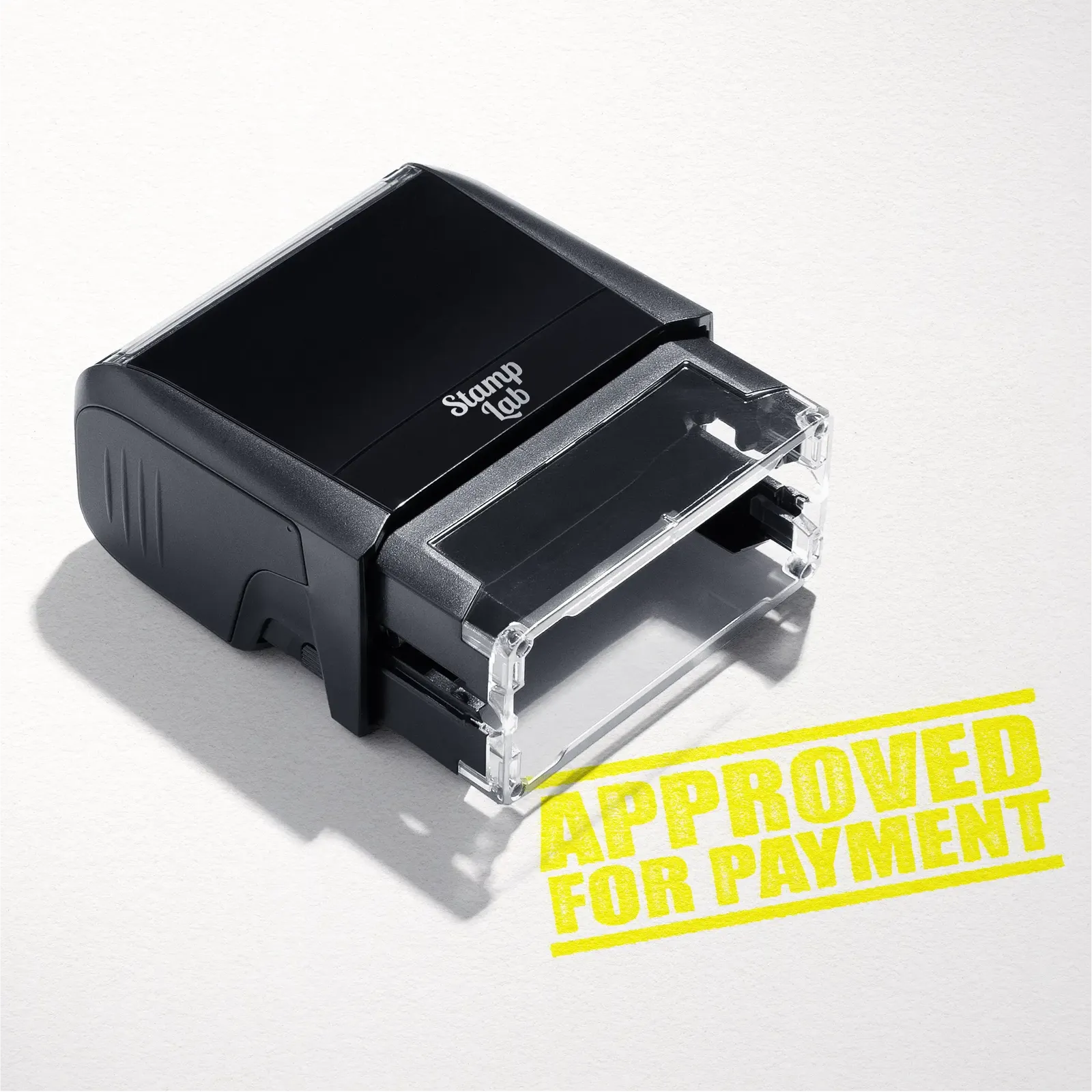 mock up design or lifestyle image of 'Approved For Payment' rubber stamp yellow ink in paper background stampers hand stamp office business inventory documents
