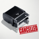 mock up design or lifestyle image of 'Cancelled' rubber stamp red ink in paper background stampers hand stamp office business inventory documents self inking prefill refillable stamps stamping 
