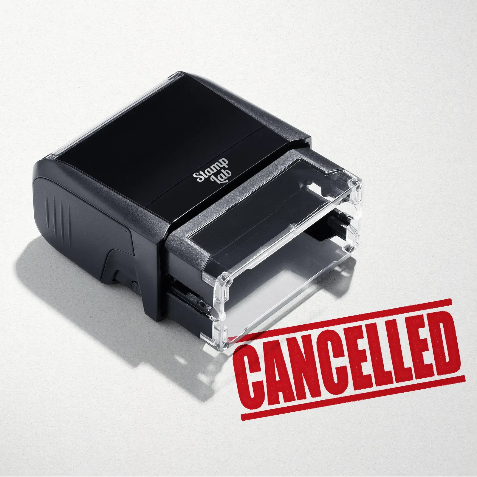 mock up design or lifestyle image of 'Cancelled' rubber stamp red ink in paper background stampers hand stamp office business inventory documents self inking prefill refillable stamps stamping 
