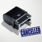 mock up design or lifestyle image of 'Cancelled' rubber stamp blue ink in paper background stampers hand stamp office business inventory documents self inking prefill refillable stamps stamping 
