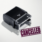 mock up design or lifestyle image of 'Cancelled' rubber stamp maroon ink in paper background stampers hand stamp office business inventory documents self inking prefill refillable stamps stamping 
