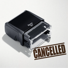 mock up design or lifestyle image of 'Cancelled' rubber stamp brown ink in paper background stampers hand stamp office business inventory documents self inking prefill refillable stamps stamping 
