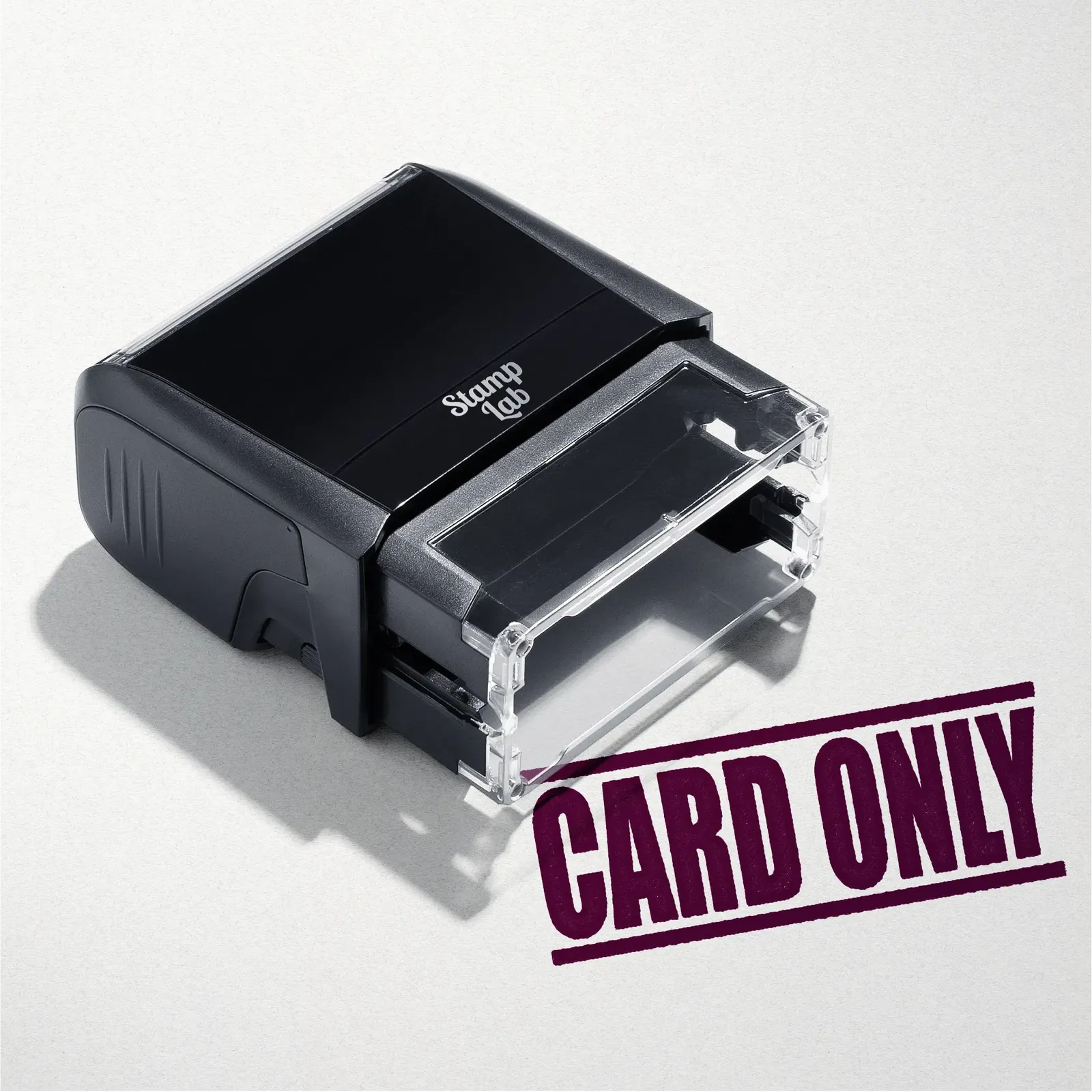 mock up design or lifestyle image of 'Card Only' rubber stamp maroon ink in paper background stampers hand stamp office business inventory documents
