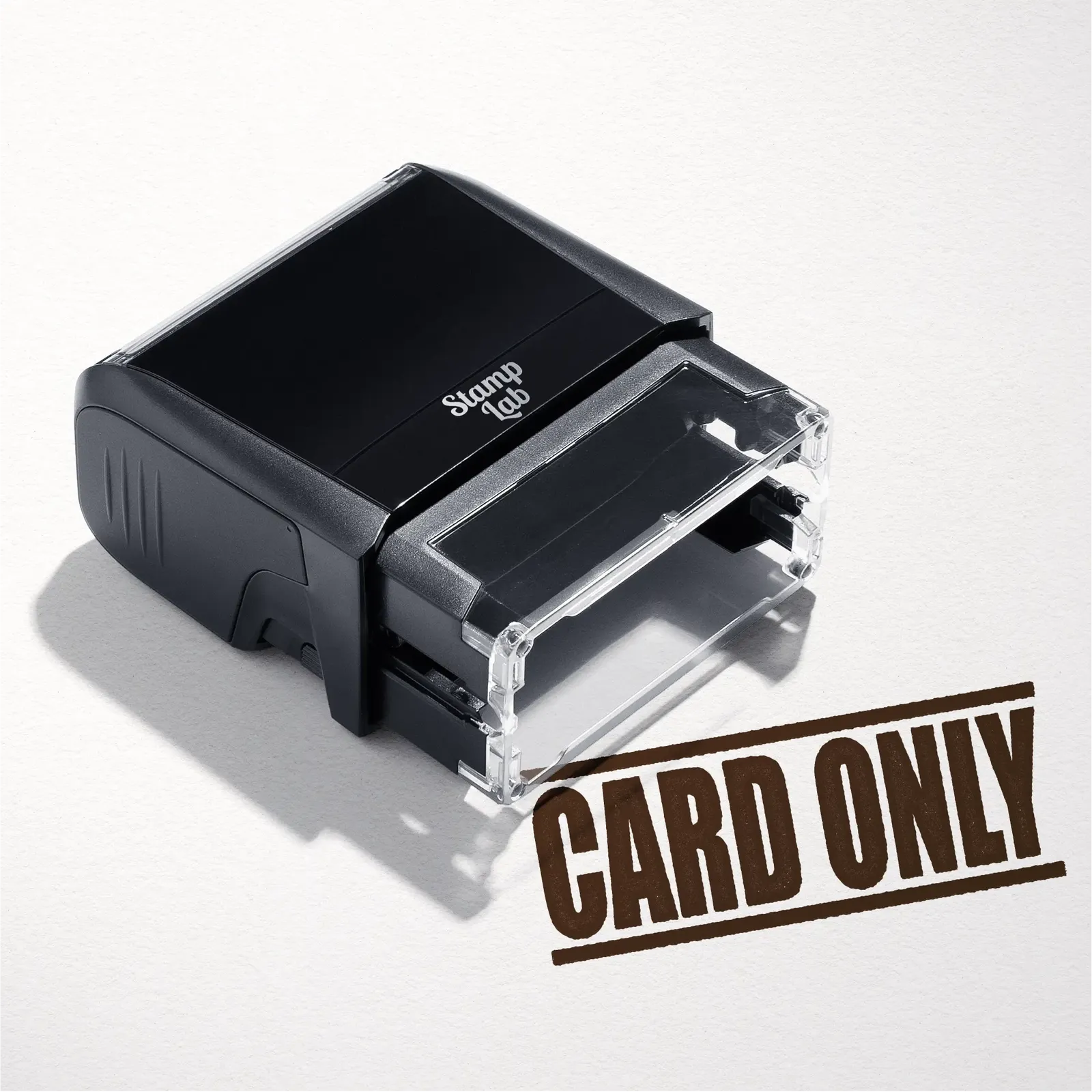 mock up design or lifestyle image of 'Card Only' rubber stamp brown ink in paper background stampers hand stamp office business inventory documents
