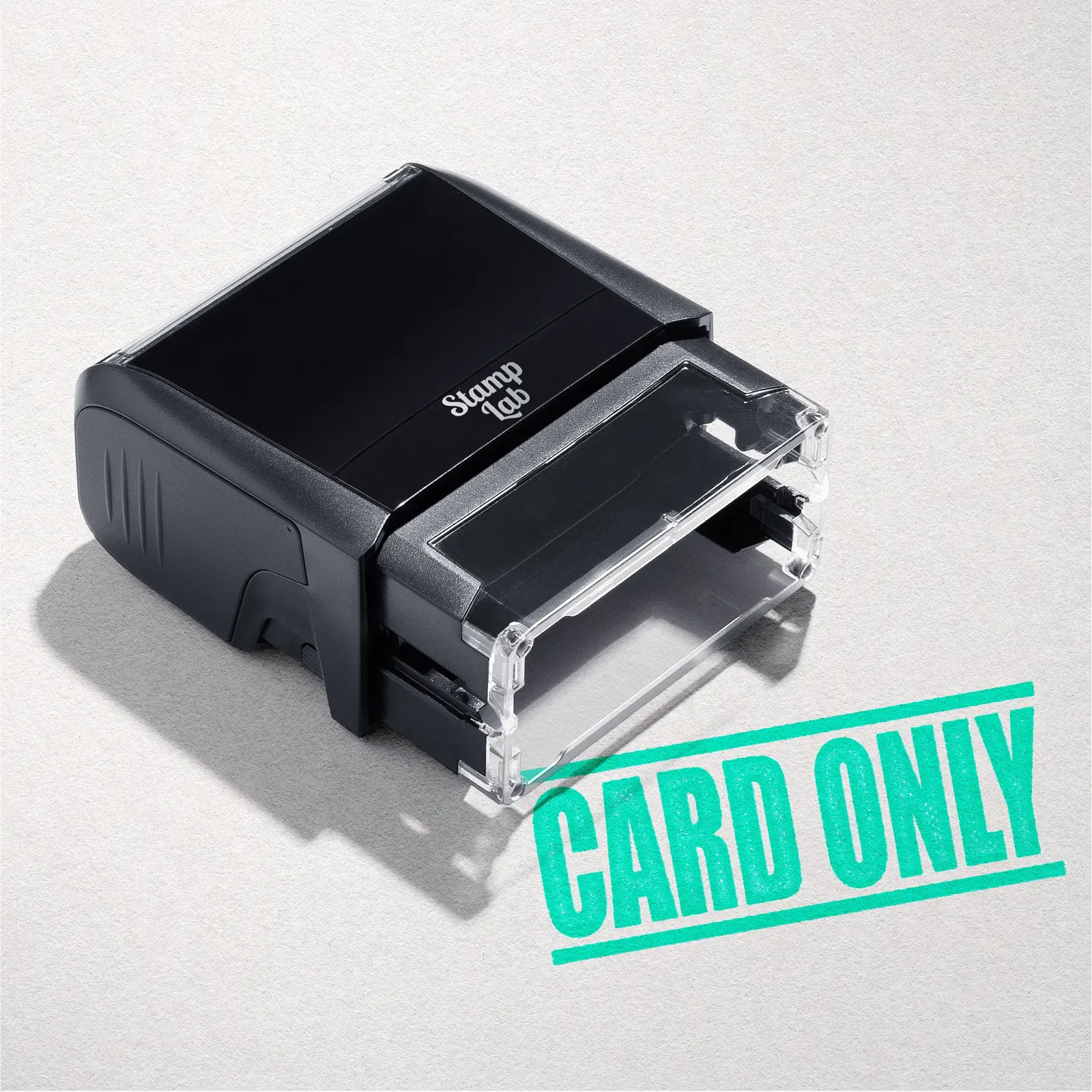 mock up design or lifestyle image of 'Card Only' rubber stamp mint ink in paper background stampers hand stamp office business inventory documents
