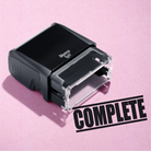 mock up design or lifestyle image of 'Complete' rubber stamp black ink in paper background stampers hand stamp office business inventory documents
