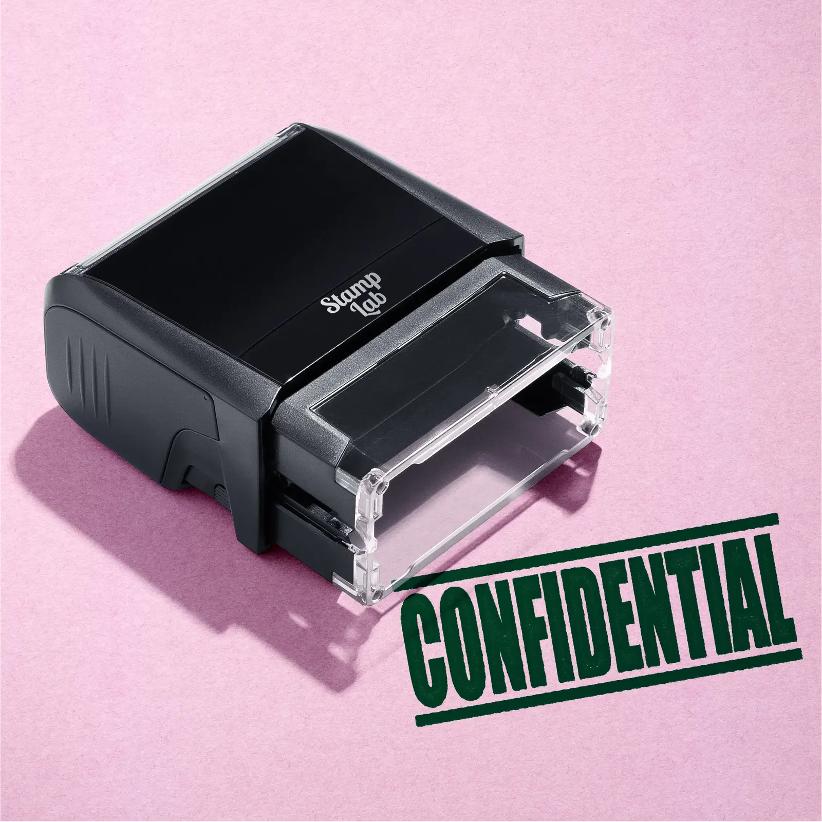 mock up design or lifestyle image of 'Confidential' rubber stamp green ink in paper background stampers hand stamp office business inventory documents self inking prefill refillable stamps stamping 
