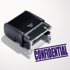mock up design or lifestyle image of 'Confidential' rubber stamp violet ink in paper background stampers hand stamp office business inventory documents self inking prefill refillable stamps stamping 
