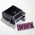 mock up design or lifestyle image of 'Confidential' rubber stamp maroon ink in paper background stampers hand stamp office business inventory documents self inking prefill refillable stamps stamping 
