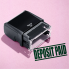 mock up design or lifestyle image of 'Deposit Paid' rubber stamp green ink in paper background stampers hand stamp office business inventory documents self inking prefill refillable stamps stamping 
