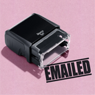 A black self inking rubber stamp with the word 'EMAILED' printed in bold capital letters in black ink. stampers hand stamp office business inventory documents 