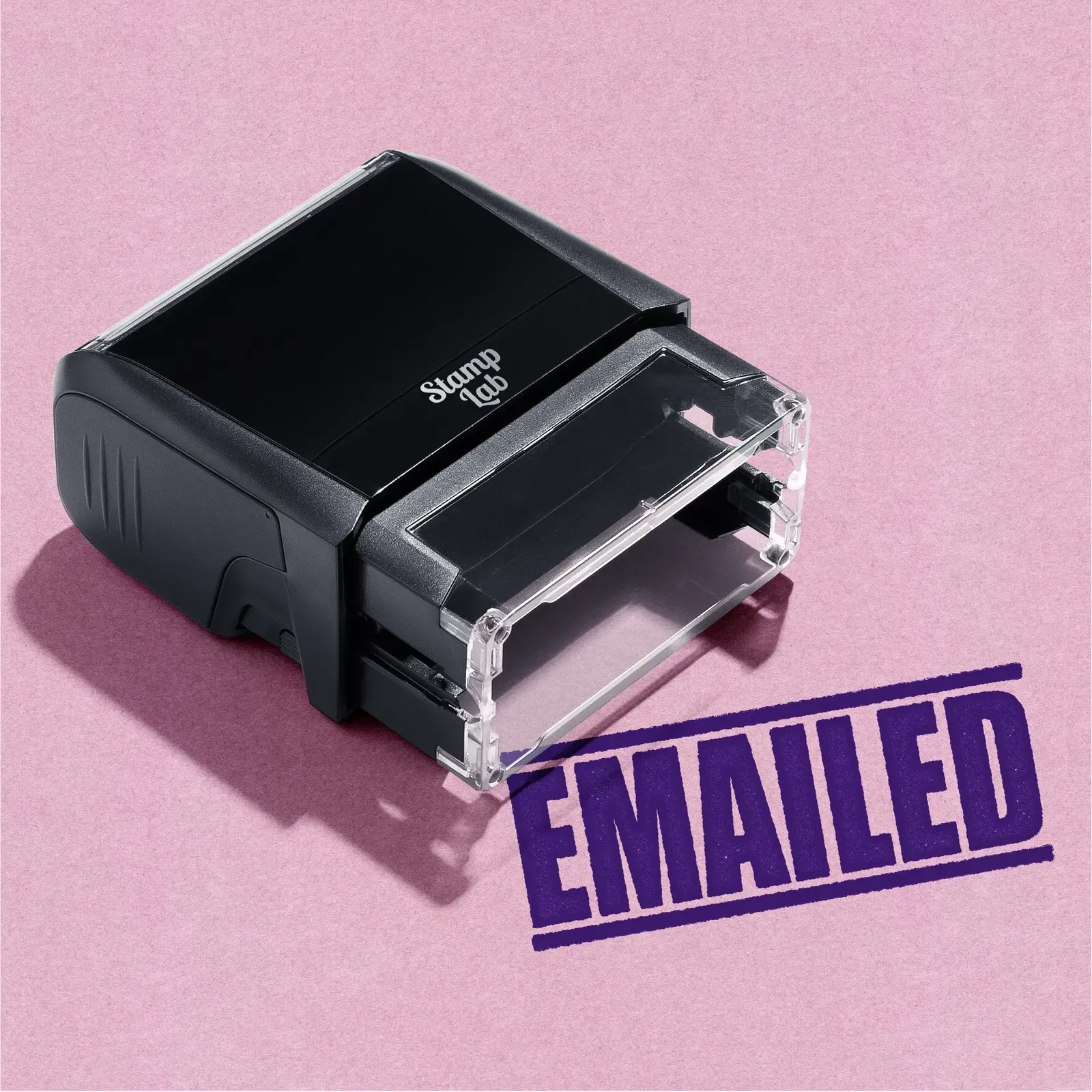 Mock-design of 'EMAILED' rubber stamp violet ink in paper background
stampers hand stamp office business inventory documents 