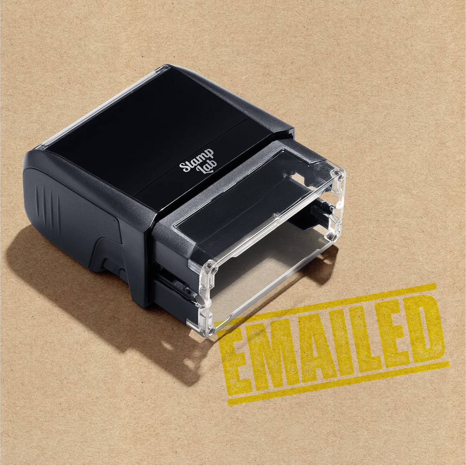 Mock up design of 'EMAILED' rubber stamp yellow ink in paper background stampers hand stamp office business inventory documents 
