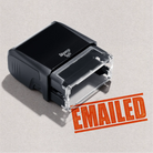 Mock up design or lifestyle image of 'EMAILED' rubber stamp orange  ink in paper background stampers hand stamp office business inventory documents 
