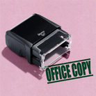 mock up design or lifestyle image of 'Office Copy' rubber stamp green ink in paper background stampers hand stamp office business inventory documents self inking prefill refillable stamps stamping 
