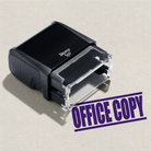 mock up design or lifestyle image of 'Office Copy' rubber stamp violet ink in paper background stampers hand stamp office business inventory documents self inking prefill refillable stamps stamping purple

