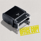 mock up design or lifestyle image of 'Office Copy' rubber stamp yellow ink in paper background stampers hand stamp office business inventory documents self inking prefill refillable stamps stamping 

