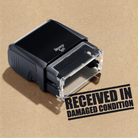 pre-inked Received In Damaged Condition rubber stamp black ink 